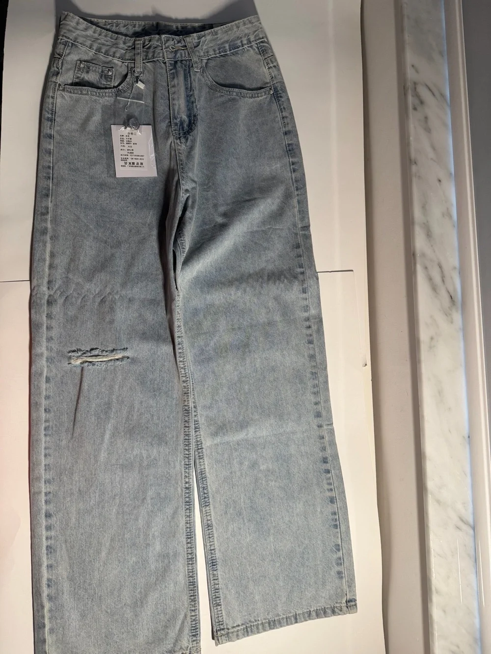 Women’s Light Wash High-Waisted Wide Leg Distressed Jeans